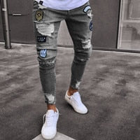 Load image into Gallery viewer, PADEGAO new Mens hiphop pencil jeans Hole Cowboy ripple design slim fit jeans high street Patch embroidered trousers moto jeans
